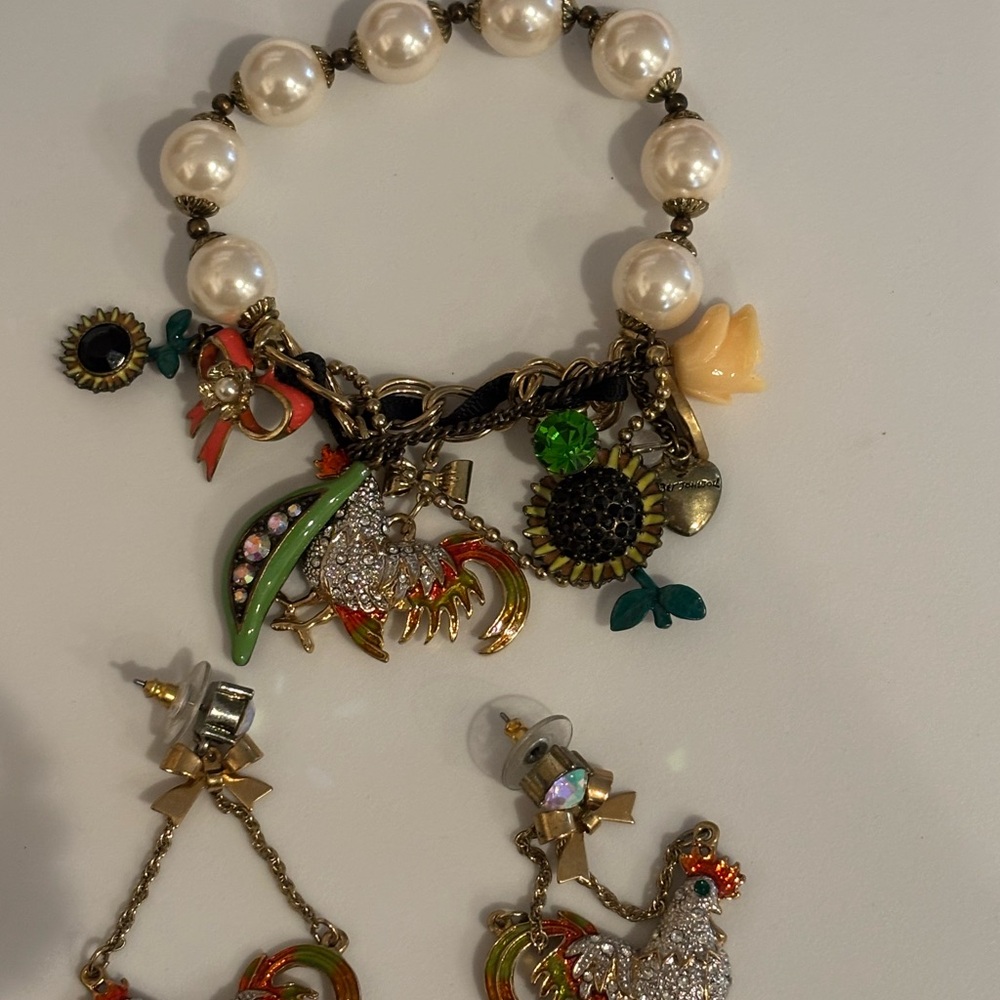 Charming Pearl stretchy Bracelet with Colorful Charms by Betsey Johnson.